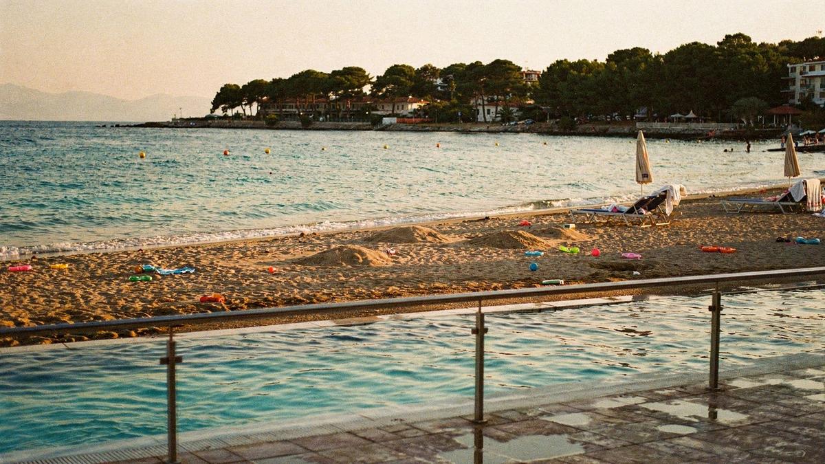 Shallow children's pool and gently shelving sandy beach on the Antalya coast in Turkey