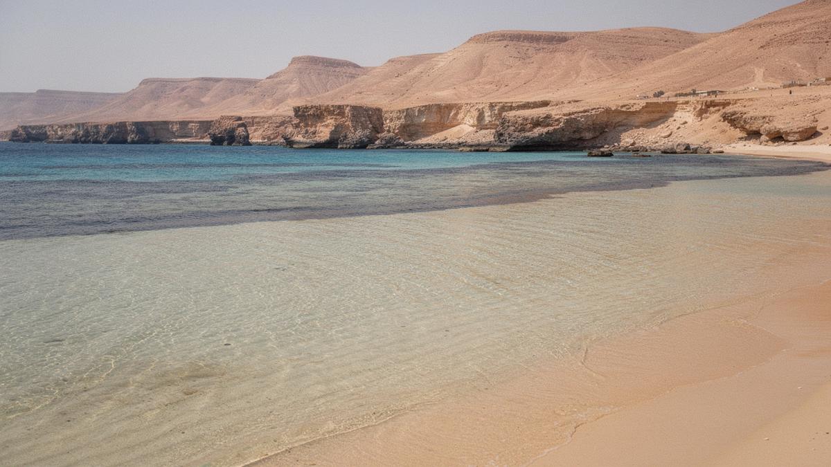Calm sandy lagoon with a reef shelf in the distance at Sharm El Sheikh on the Red Sea